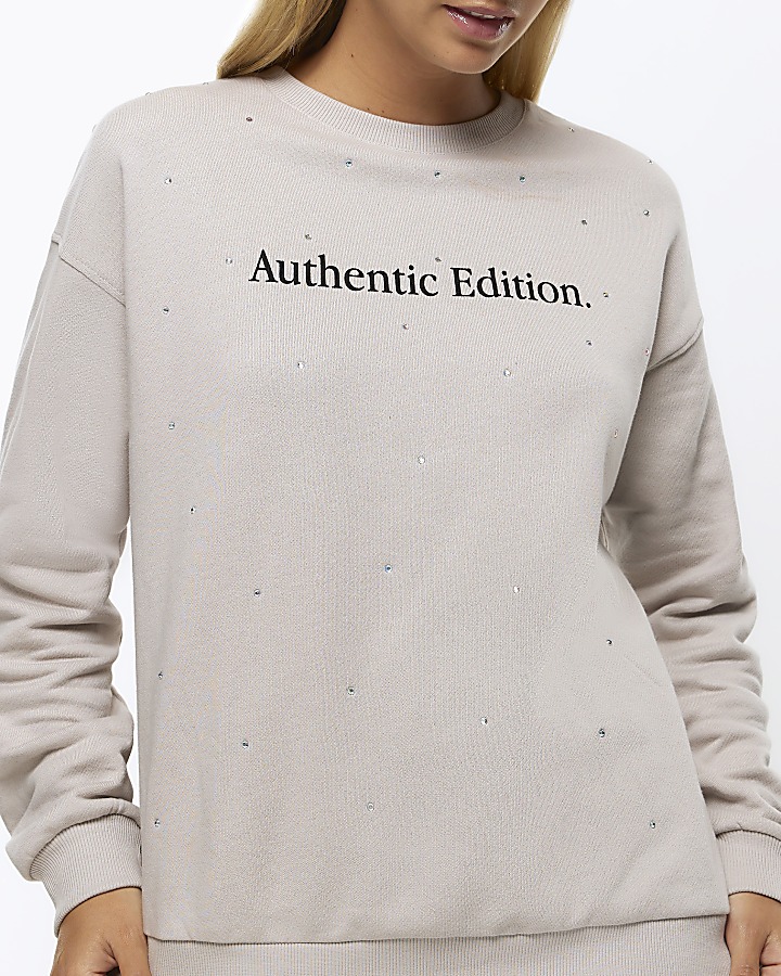 Cream embellished sweatshirt