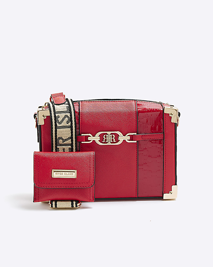 Red embossed trunk bag River Island