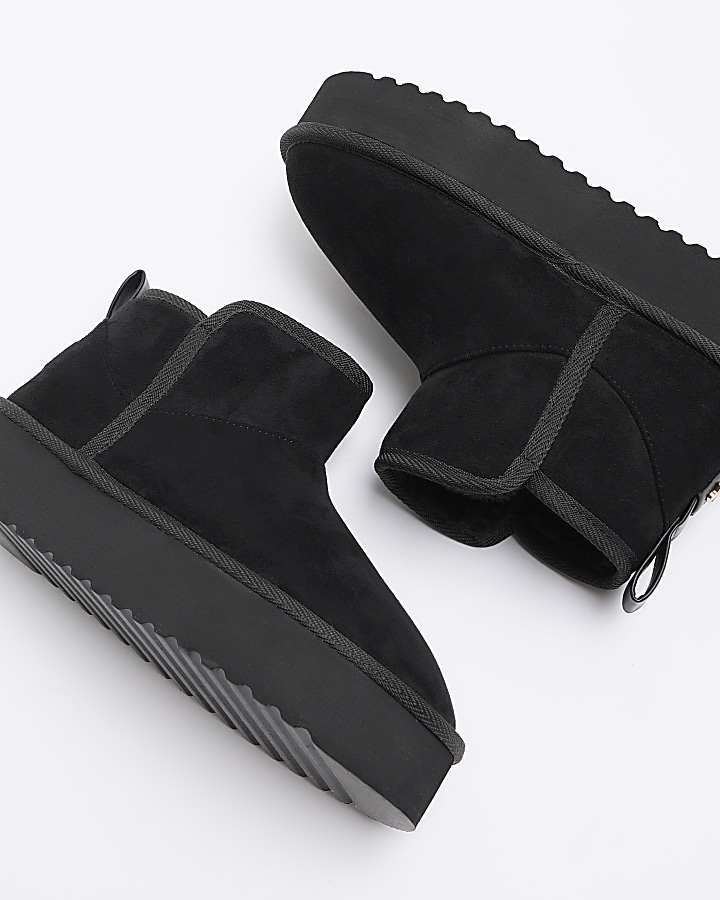 Black faux fur platform boots