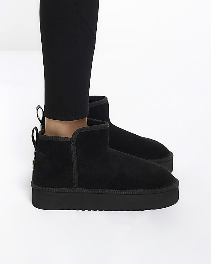 Black faux fur platform boots | River Island