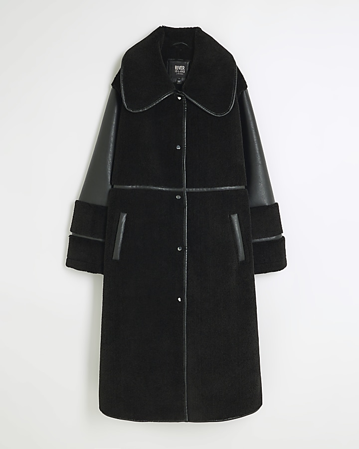 Black longline shearling coat