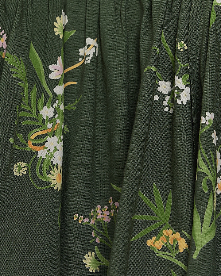 Green floral wrap blouse