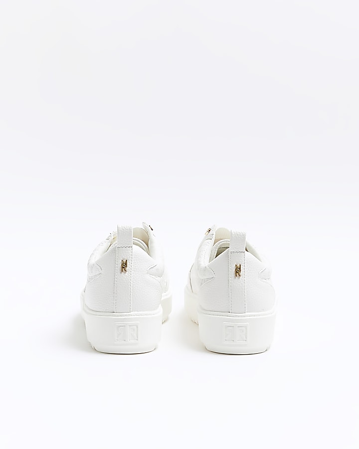 White wide fit embossed RI monogram trainers | River Island