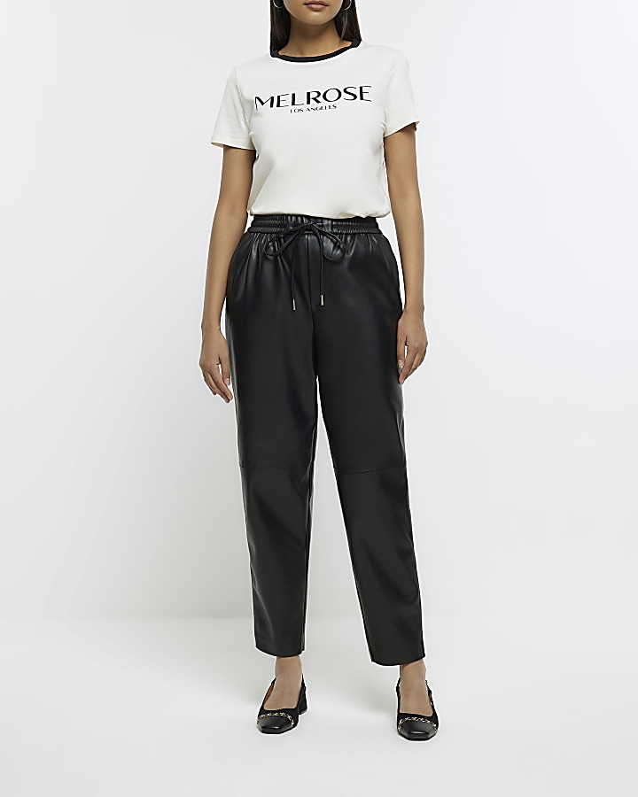 Black faux leather seam detail trousers | River Island