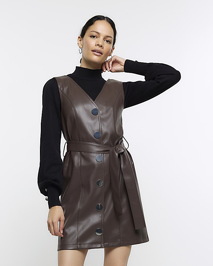 Brown faux leather pinafore mini dress | River Island