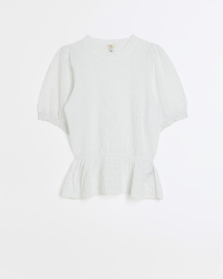 White knitted puff sleeve peplum top
