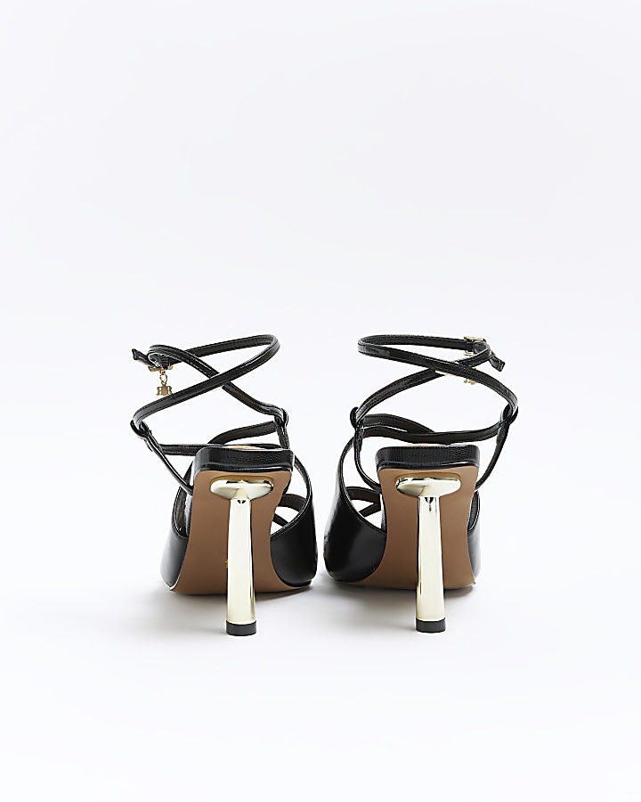 Black cross over heeled sandals