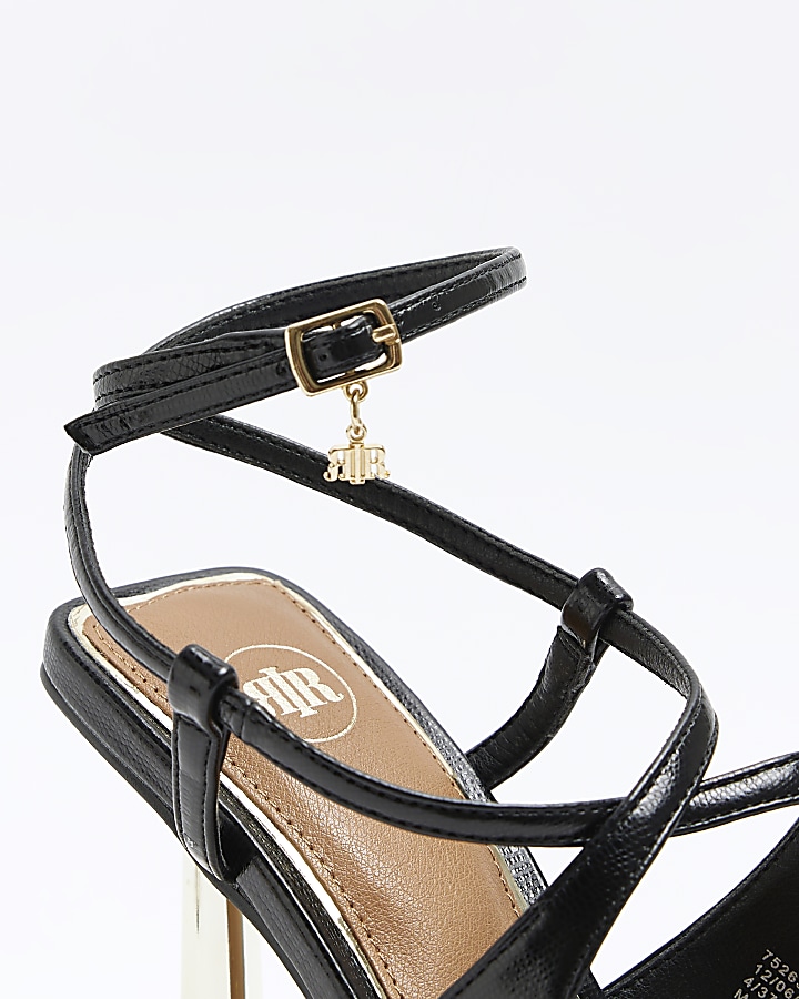Black cross over heeled sandals
