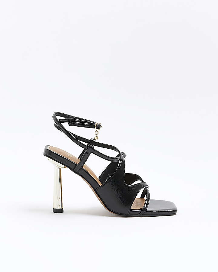 Black cross over heeled sandals | River Island