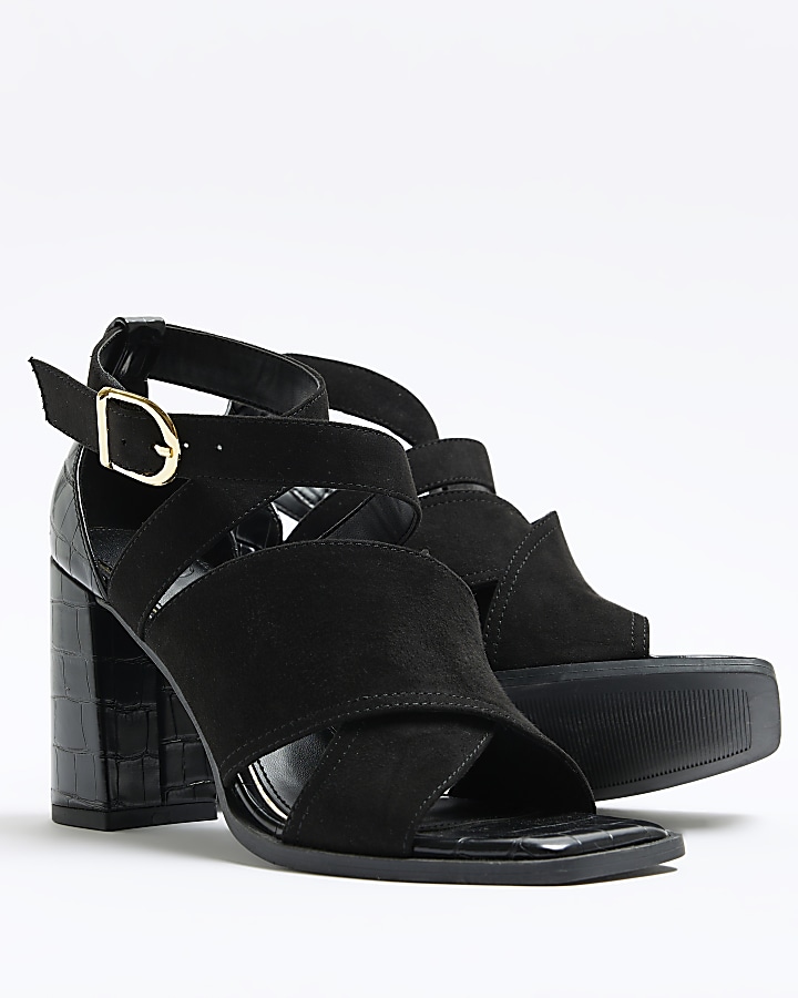 Black strappy heeled shoe boots
