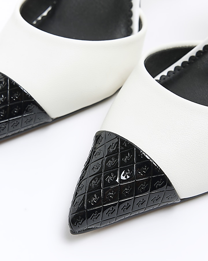 Cream embossed heeled court shoes River Island