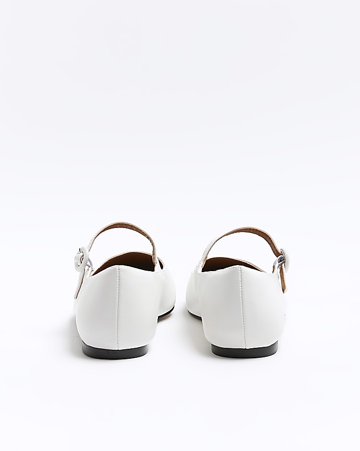 White flat ballet shoes