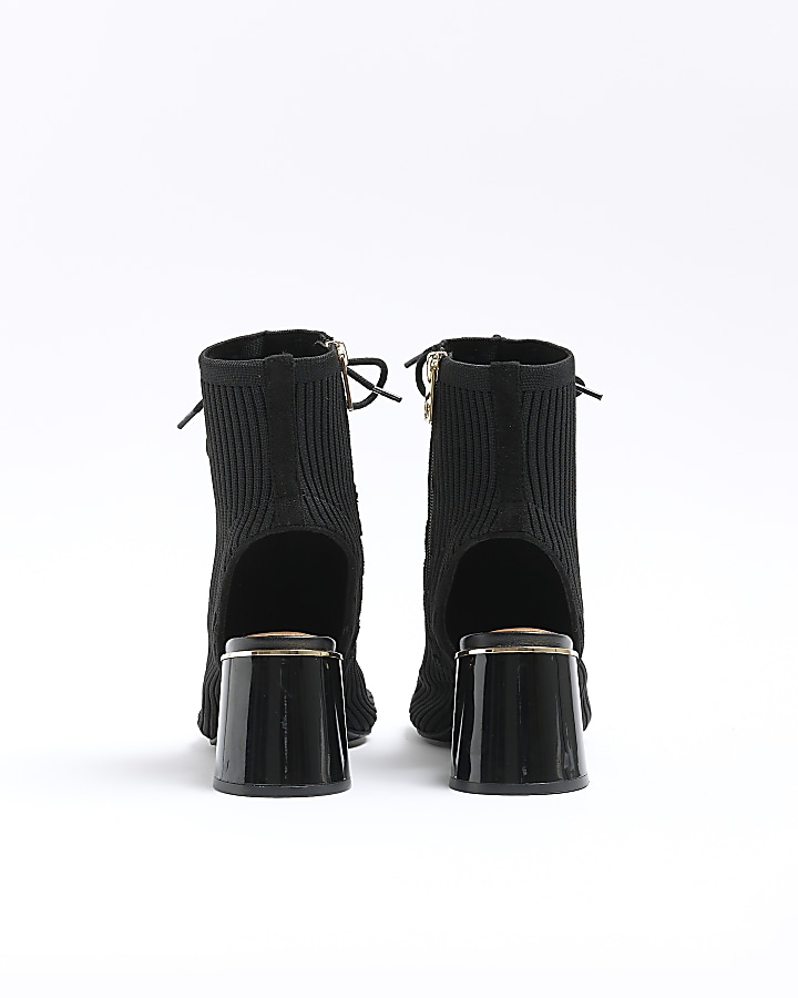 Black knit open toe heeled boots