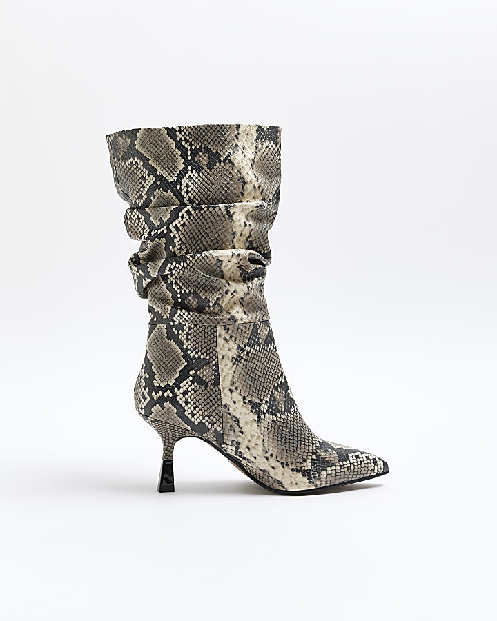 Beige animal print slouch heeled boots