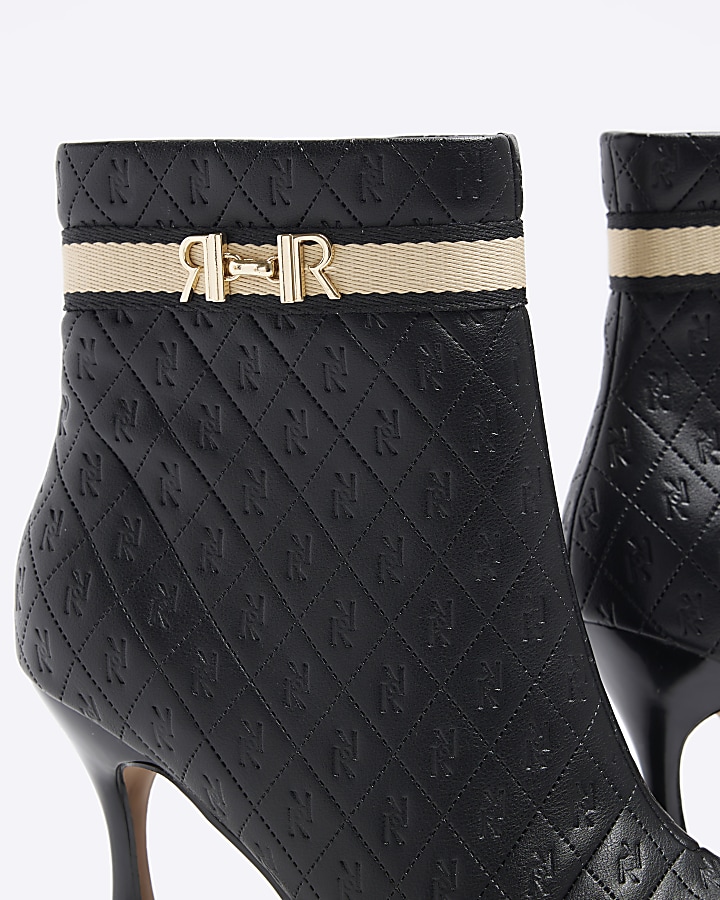 Black RI monogram heeled ankle boots