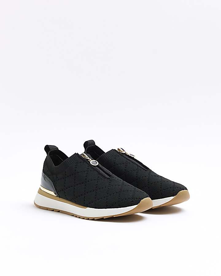 Black quilted zip trainers | River Island