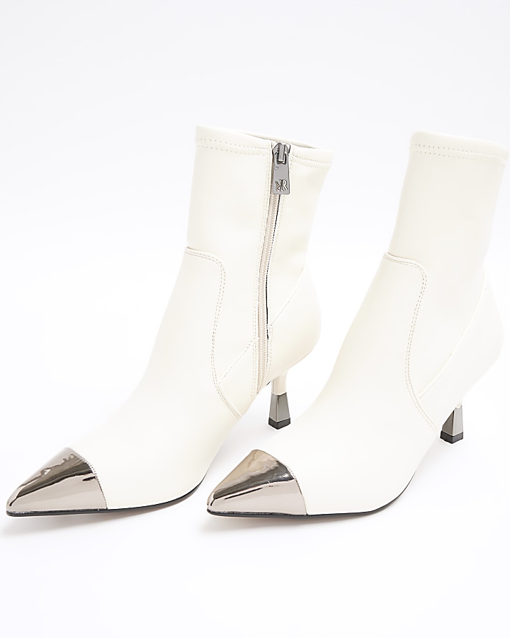 Cream toe cap heeled ankle boots