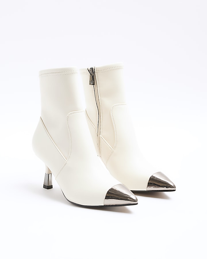 Cream toe cap heeled ankle boots