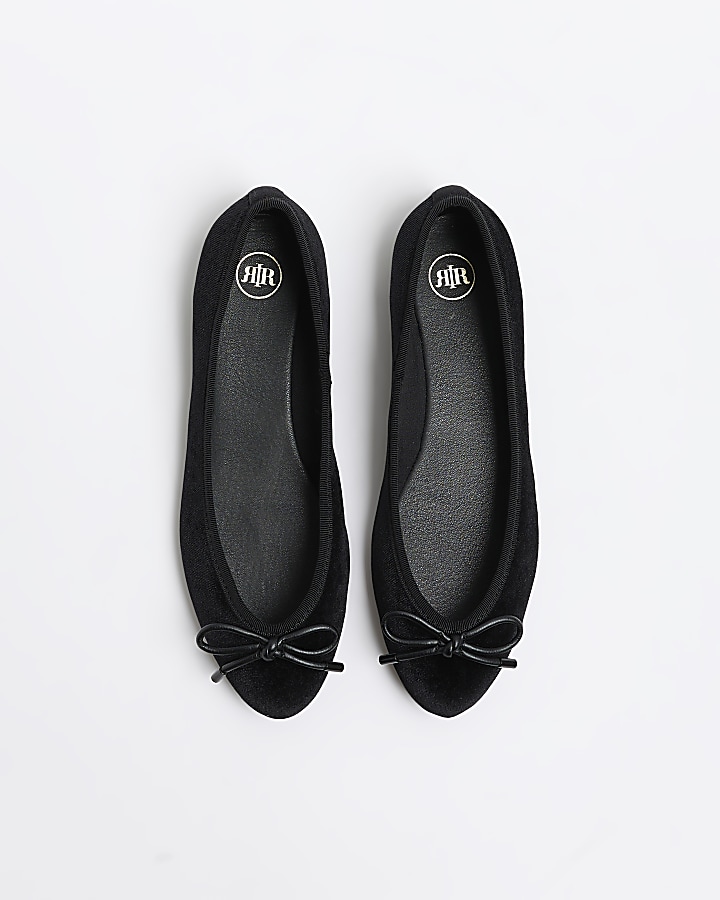 Black bow ballet shoes