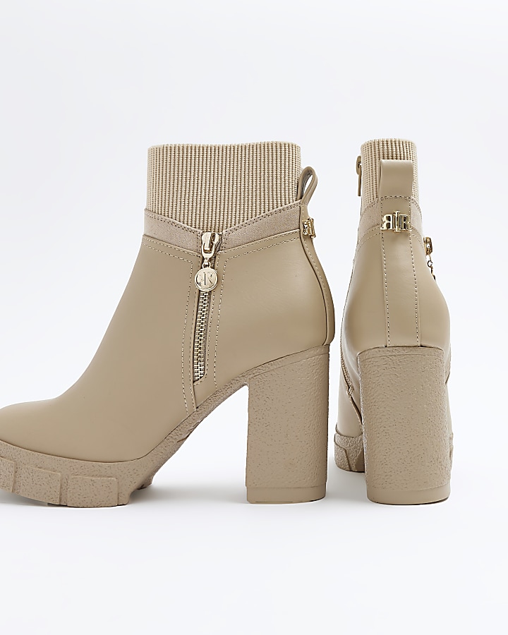 Cream side zip heeled ankle boots