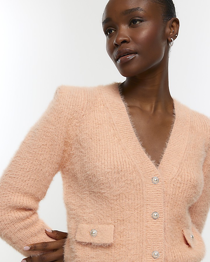 Coral knitted shoulder pad cardigan