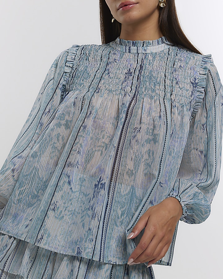 Blue abstract shirred blouse