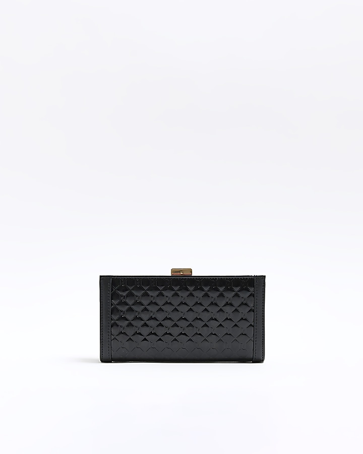 Black quilted clip top purse