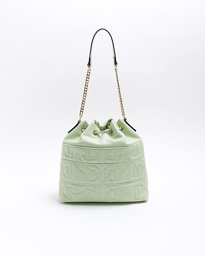 Green quilted drawstring bag