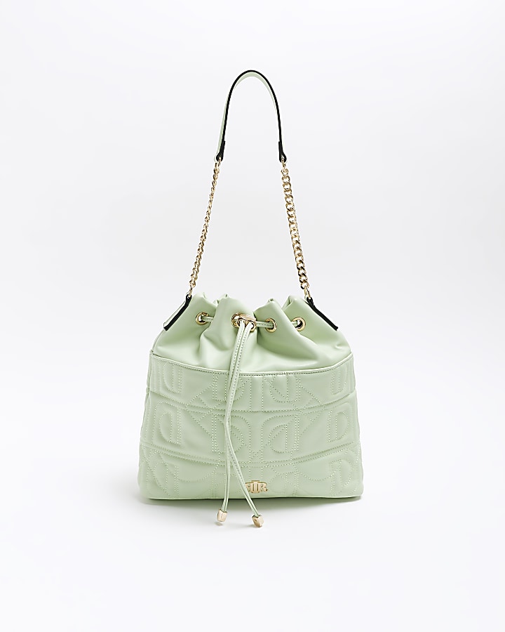 Green quilted drawstring bag