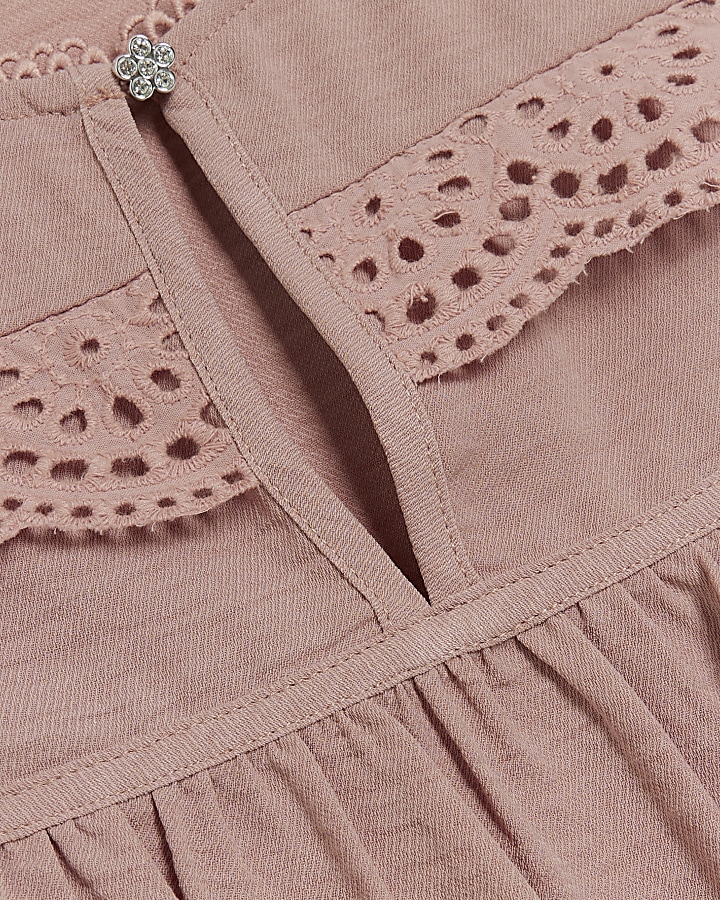 Pink ruffle sleeveless blouse