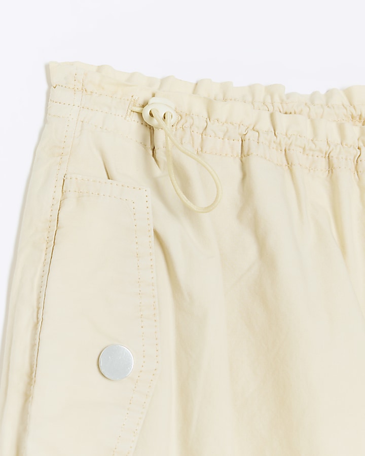 Yellow baggy low rise parachute trousers