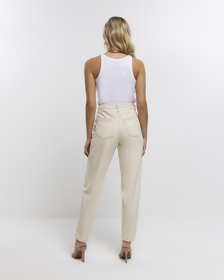 Cream high waisted tapered jeans