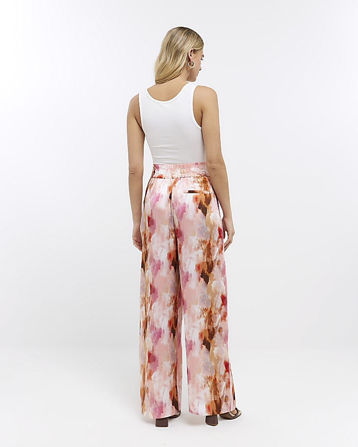 Pink abstract print pleated wide leg trousers