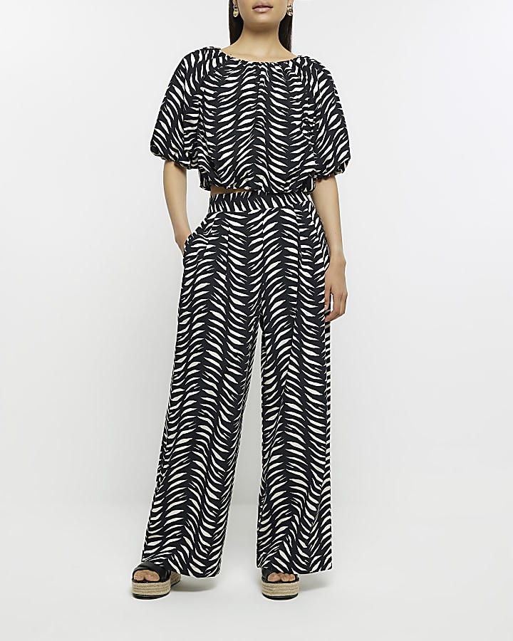Black abstract print wide leg trousers | River Island