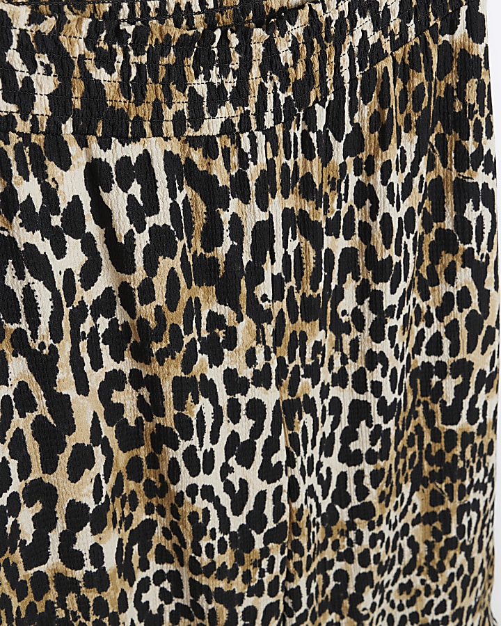 Beige leopard print wide leg trousers