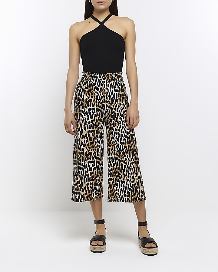 Beige animal print wide leg trousers