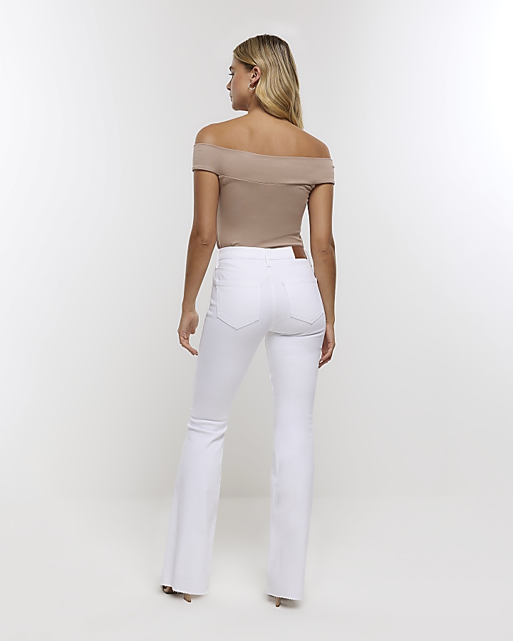 White mid rise flare jeans