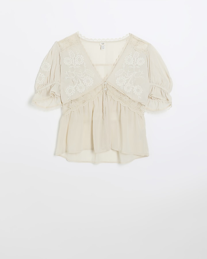 Cream lace embroidered peplum blouse