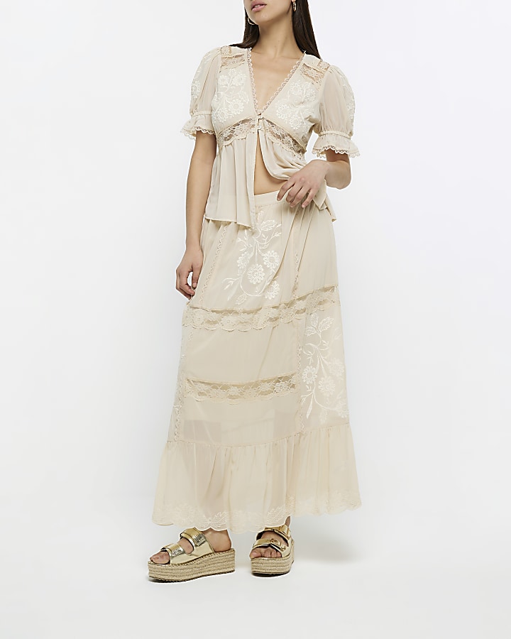 Cream lace embroidered peplum blouse River Island