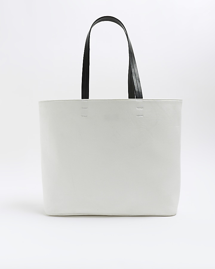 White laser cut flower shopper bag