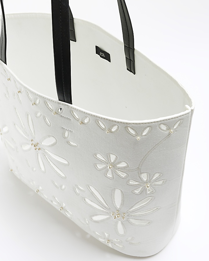 White laser cut flower shopper bag