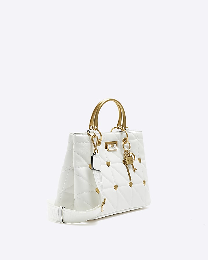White quilted heart stud tote bag