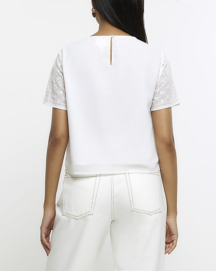 White embroidered short sleeve top
