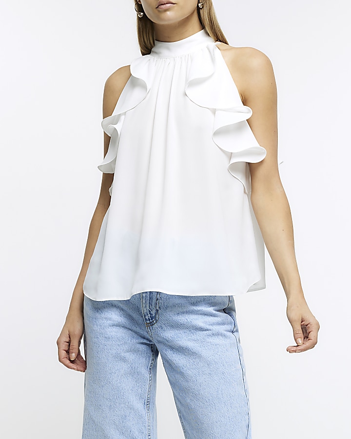 White ruffle sleeveless blouse