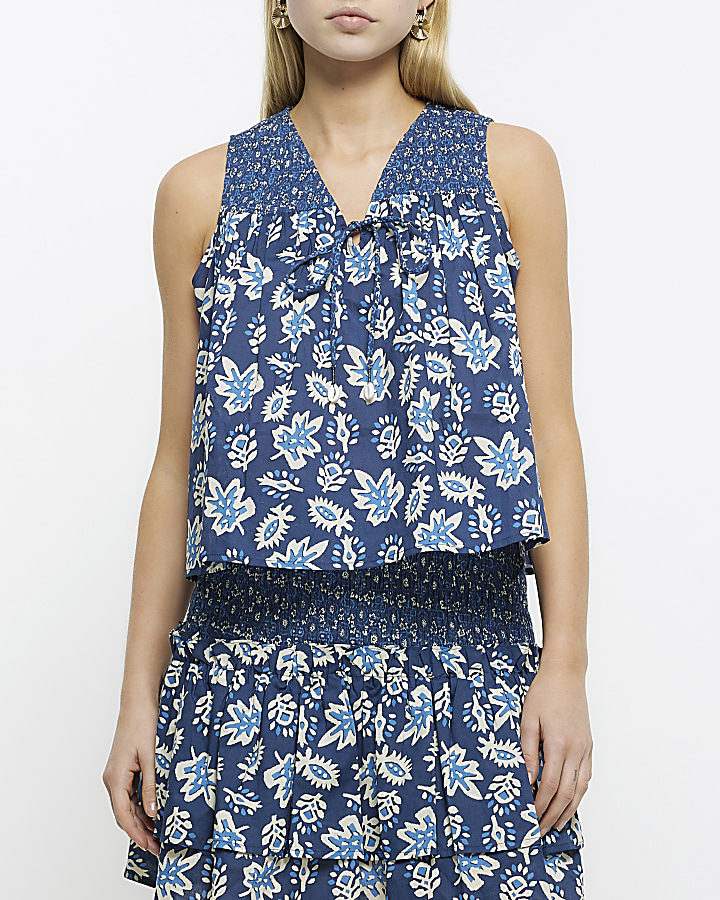 Blue floral shirred sleeveless top