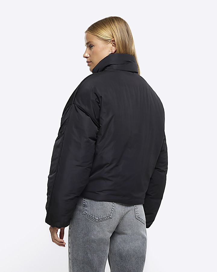 Black puffer jacket River Island