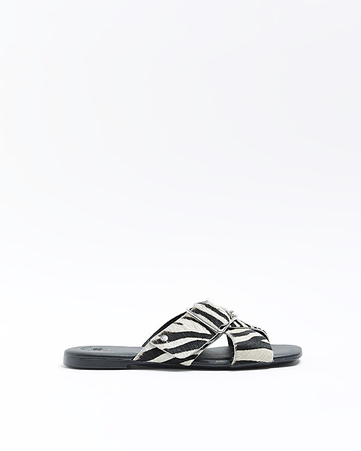 Black animal print flat sandals | River Island