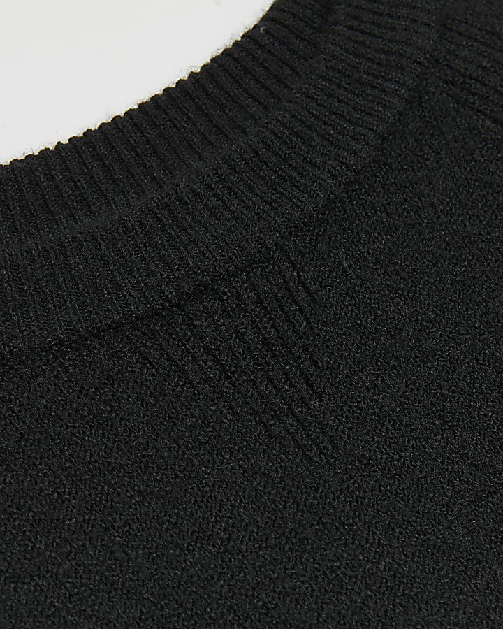 Plus black long sleeve jumper mini dress