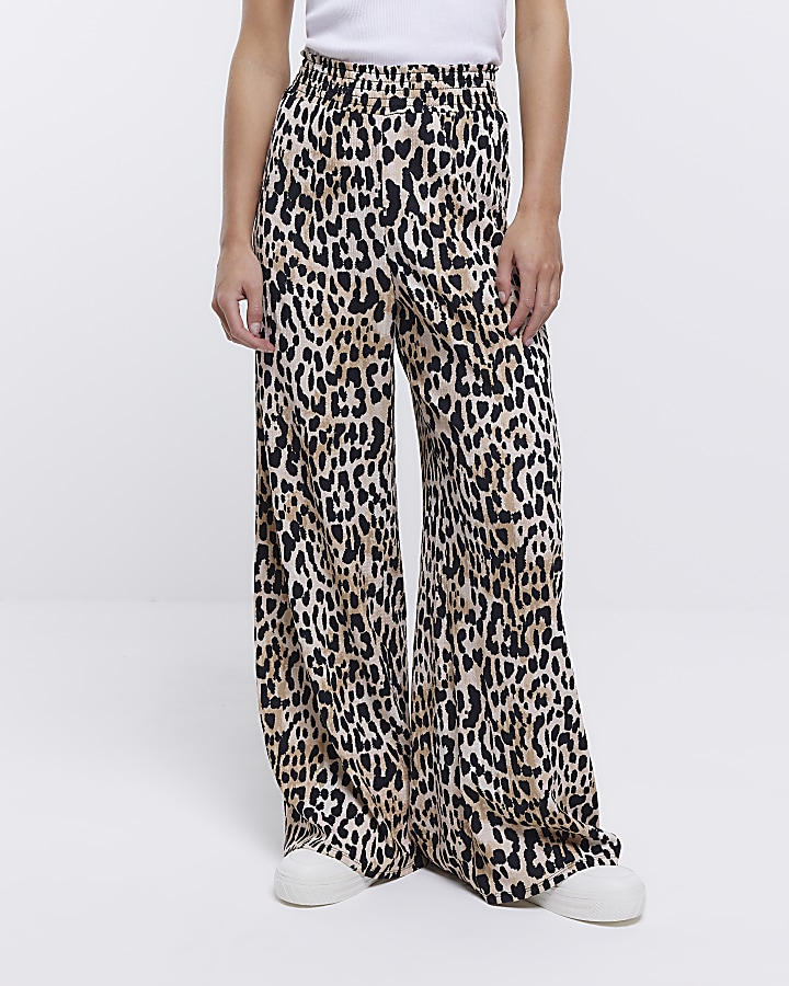 Petite beige leopard print flare trousers