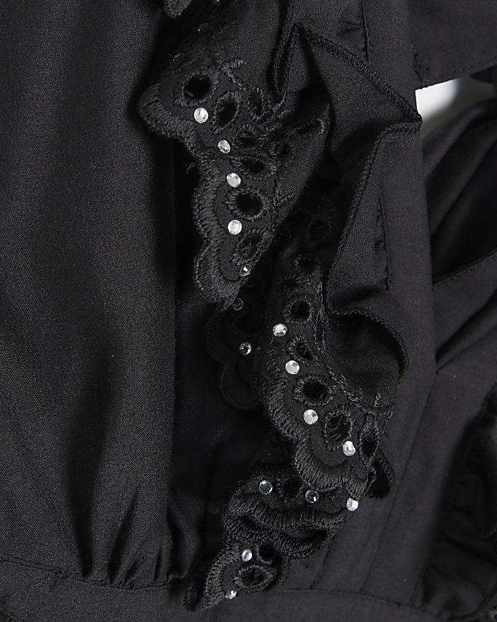 Black frill detail tie back playsuit